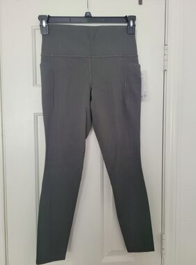 NWT Athleta Salutation Stash Leggings size M in Mountain Olive